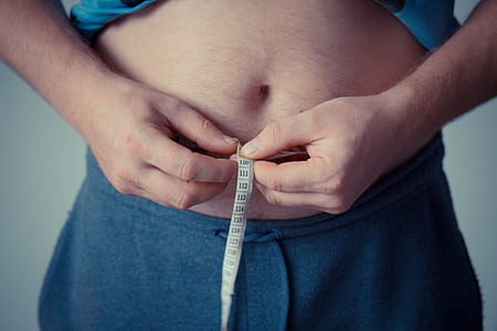 man holding measuring tape thumbnail