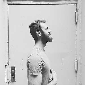 gray scale photo of man in shirt thumbnail