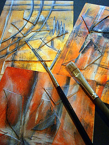 two black paint brushes on painting thumbnail