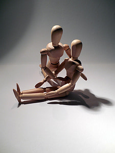 two brown wooden manikins thumbnail
