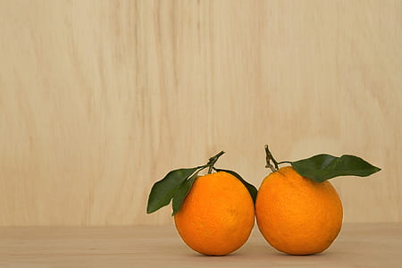 two orange fruits thumbnail