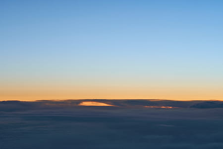 white and blue sky during blue hour thumbnail