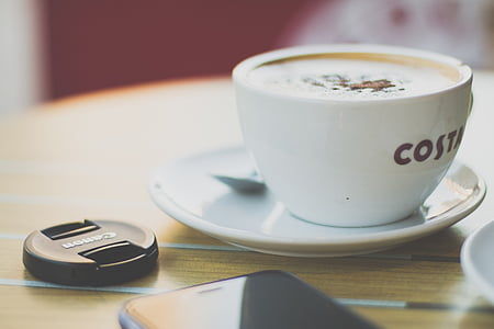 coffee in ceramic cup on saucer thumbnail
