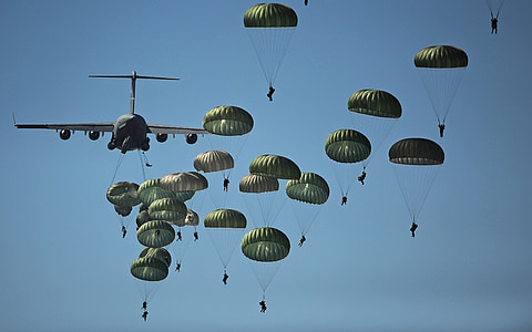 photo of people doing parachutes on sky at daytime thumbnail