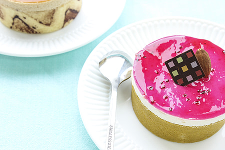 green and pink cake on white plate thumbnail