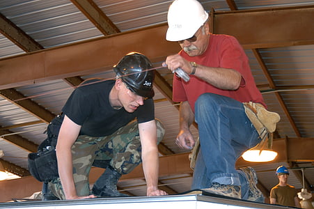 two men fixing roof thumbnail