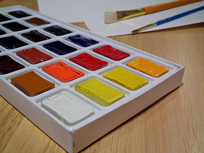 water color palette on beige wooden surface thumbnail