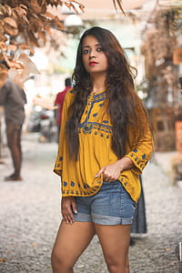 Woman Wearing Yellow Top thumbnail