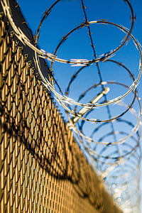 chain link fence with barbwire thumbnail
