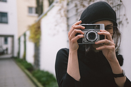 Girl with a vintage camera thumbnail