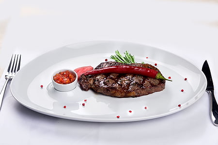 grilled food served on white plate thumbnail