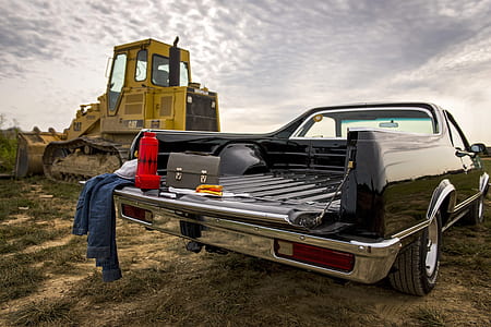 black car and brown suitcase thumbnail