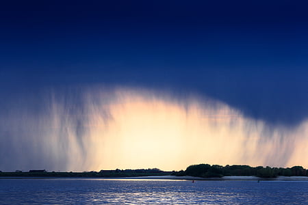 landscape photo of island and ocean thumbnail