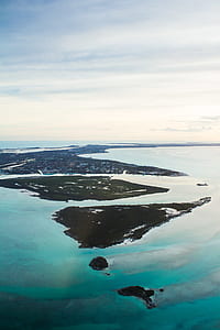 aerial photography of island and body of water at daytime thumbnail