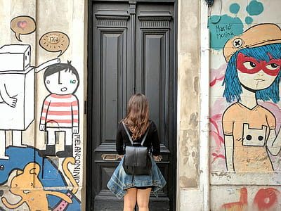woman standing in front of close door thumbnail