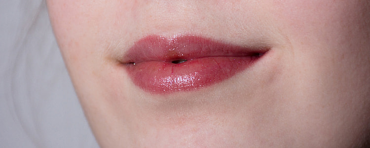 person wearing red lipstick thumbnail