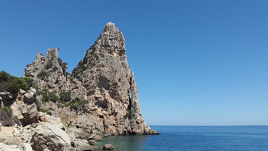 mountain near body of water thumbnail