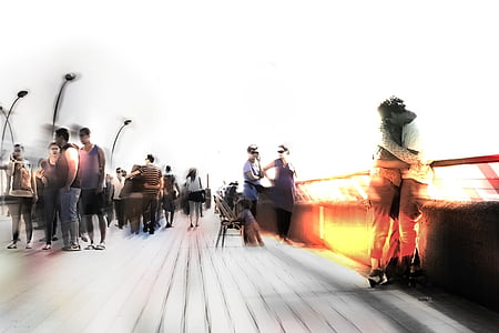 time-lapse photography of people standing on bridge thumbnail