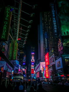 people walking on street during night thumbnail