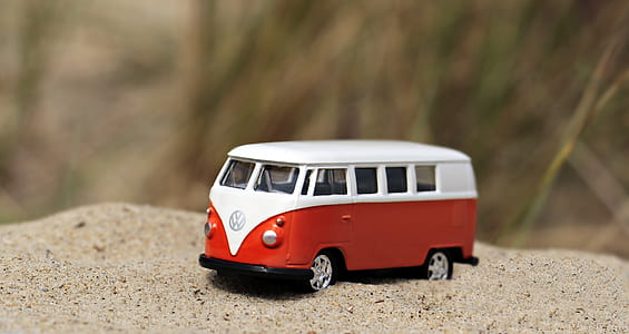 red and white Volkswagen die-cast thumbnail