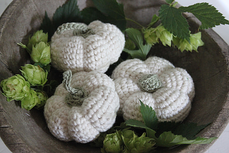 three white knitted squash table decor thumbnail