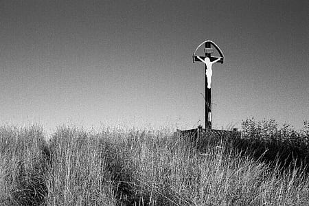 grayscale photo of Jesus on the cross thumbnail