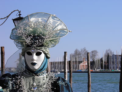 mascot near body of water thumbnail