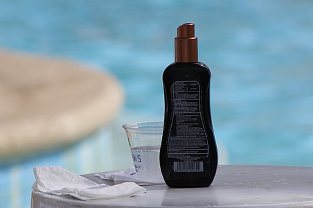 selective focus photo of black plastic bottle thumbnail
