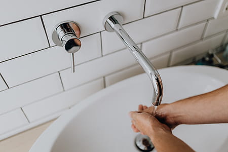 Washing of hands under running water thumbnail