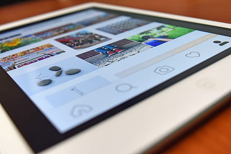 White Tablet Computer Surfing Pictures thumbnail