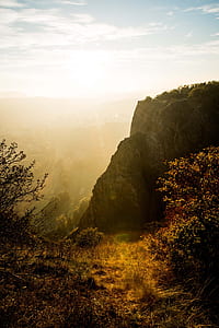 mountain range with forest during sunset thumbnail