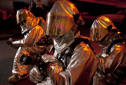 person wearing glitter suit with helmet thumbnail