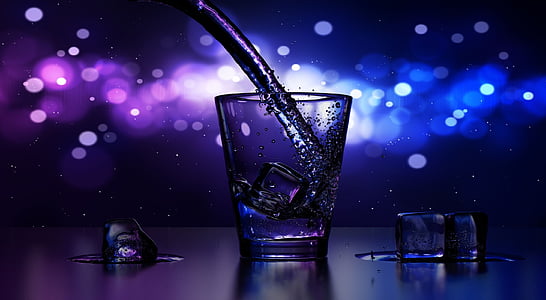 liquid being pour on clear glass shot glass thumbnail