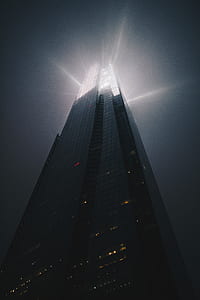 low angle photo of high-rise building under cloudy sky at daytime thumbnail