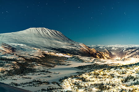 mountain covered by snow during winter thumbnail