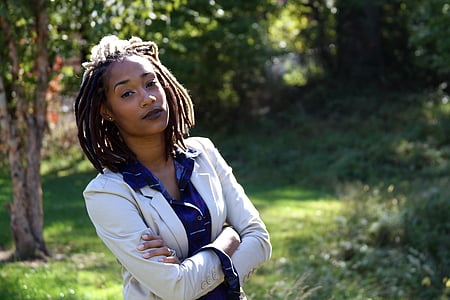 woman in beige suit jacket thumbnail