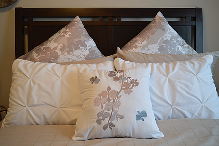 brown and white double bed thumbnail