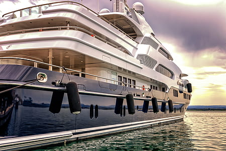 white and blue cruise ship on body of water thumbnail