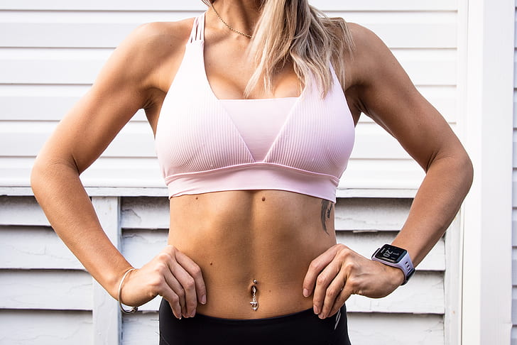 woman wearing pink sports bra