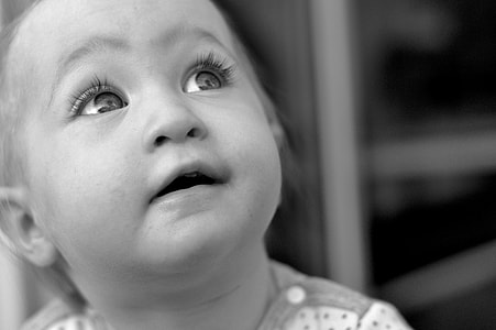 grayscale photo of child thumbnail