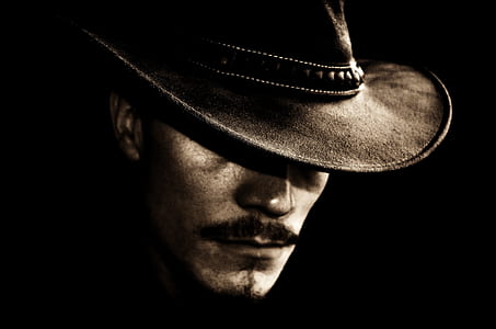 man wearing black hat thumbnail