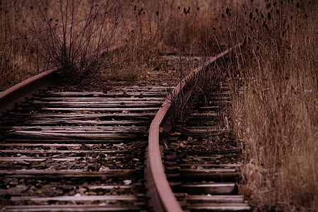 selective focus photography of brown railway thumbnail