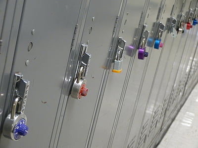 combination locks and padlocks on closed lockers inside room thumbnail