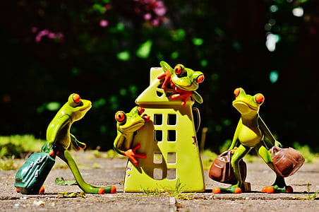 four green frogs with suit cases thumbnail