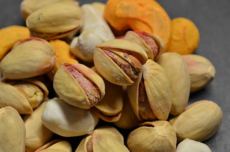 brown pistachio nuts on brown surface thumbnail