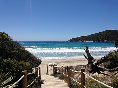 two white loungers on beach thumbnail