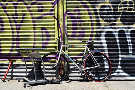 gray bike on gray roller shutter thumbnail
