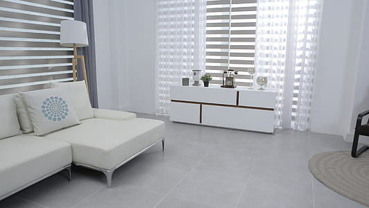 white fabric sectional sofa near white wooden TV stand thumbnail