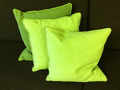 three green throw pillows thumbnail