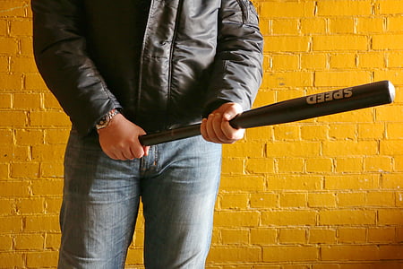 man holding black Speed baseball bat thumbnail